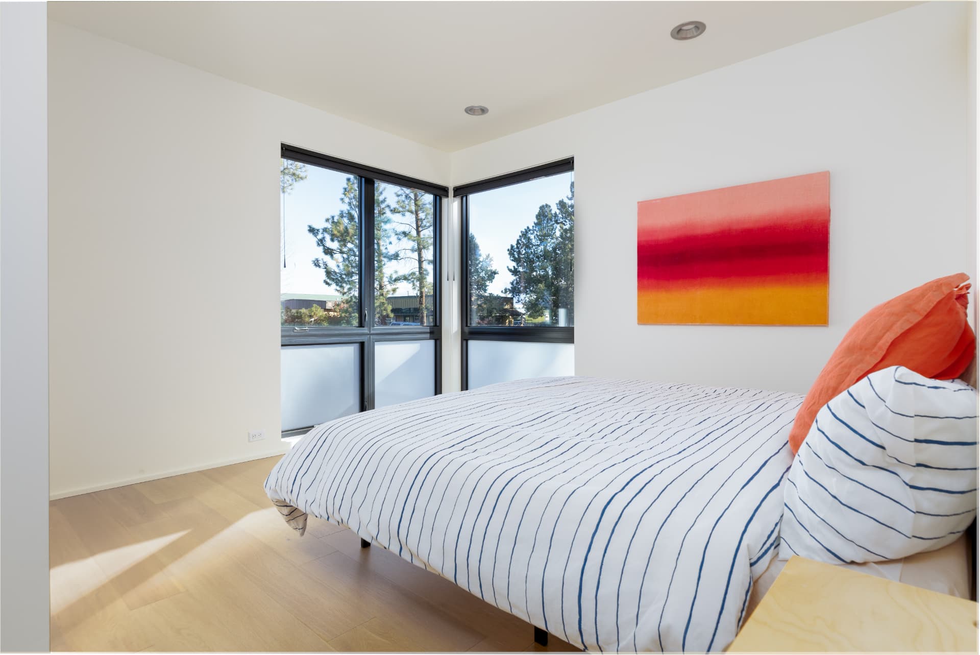 Bedroom with corner windows